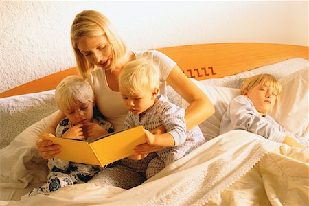 Mother Reading to Children Stock Photo - Rights-Managed, Code: 700-00093555