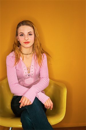 Portrait of Girl Sitting on Chair Stock Photo - Rights-Managed, Code: 700-00154649