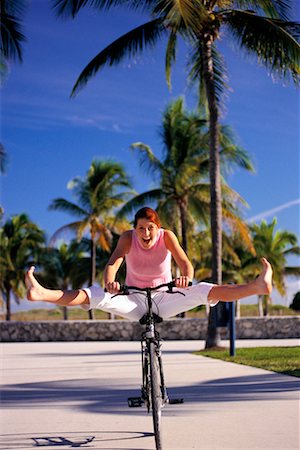 simsearch:600-03210484,k - Woman Riding a Bicycle Foto de stock - Con derechos protegidos, Código: 700-00155659