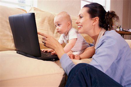 Mother and Baby with Laptop Fotografie stock - Rights-Managed, Codice: 700-00155741