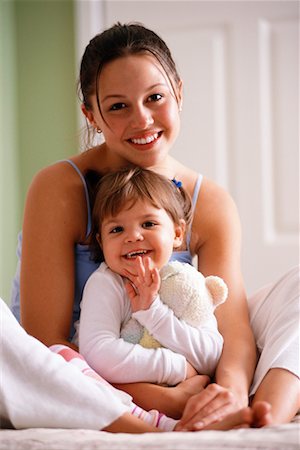 sister hugs baby - Teenager and Toddler Stock Photo - Rights-Managed, Code: 700-00155803