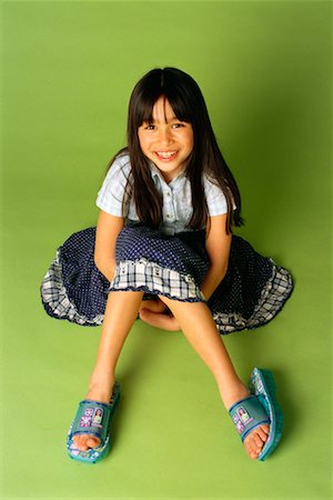 preteen girls flip flops - Girl Sitting on Floor Stock Photo - Rights-Managed, Code: 700-00155919