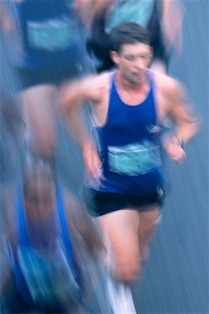 simsearch:400-04824271,k - Man Running in Marathon Fotografie stock - Rights-Managed, Codice: 700-00155984