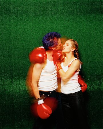 Couple Wearing Boxing Gloves Stock Photo - Rights-Managed, Code: 700-00156046