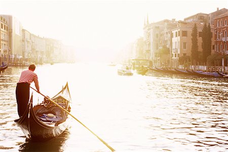 european canal boat rower - Gondolier Rowing Into Sunset Venice, Italy Stock Photo - Rights-Managed, Code: 700-00156220