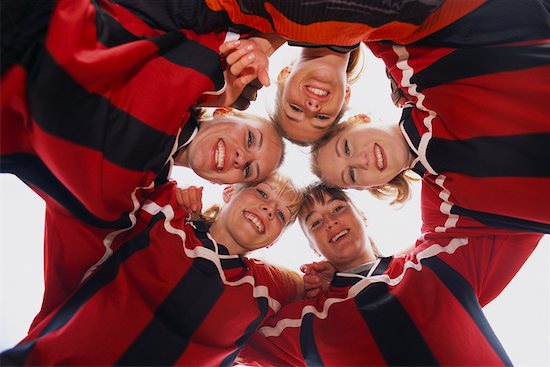 Girls' Soccer Team in Huddle Stock Photo - Premium Rights-Managed, Artist: Kevin Radford, Image code: 700-00158053