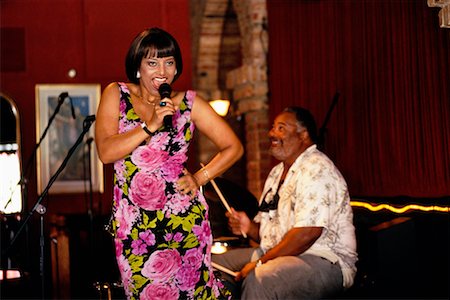 fat black man standing - Singer and Drummer Performing Together Stock Photo - Rights-Managed, Code: 700-00158124