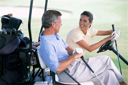simsearch:700-00036910,k - Mature Couple Talking in Golf Cart Foto de stock - Con derechos protegidos, Código: 700-00158133