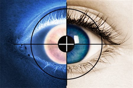 reticolo filare - Close-Up of Eyeball in Negative/ Positive Halves Fotografie stock - Rights-Managed, Codice: 700-00158235