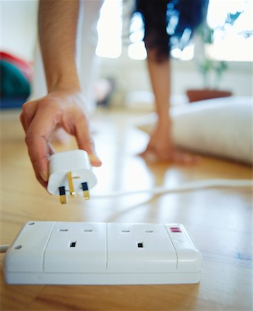 plug in with hand - Plug Going into Outlet Stock Photo - Rights-Managed, Code: 700-00158285
