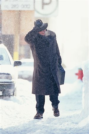 Man Walking in the Snow Stock Photo - Rights-Managed, Code: 700-00158352