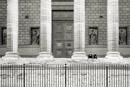 Two Young Men Sitting on Steps of Place de la Madeilene Stock Photo - Rights-Managed, Code: 700-00158969