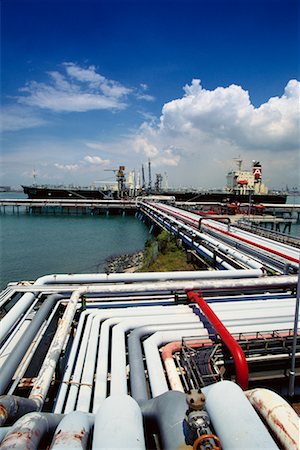 simsearch:700-03508399,k - Ship being Loaded at Petroleum Refinery Stock Photo - Rights-Managed, Code: 700-00159152