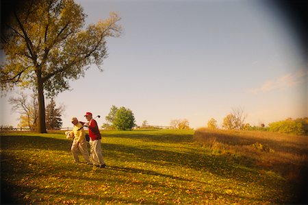Playing Golf in Autumn Stock Photo - Rights-Managed, Code: 700-00150678