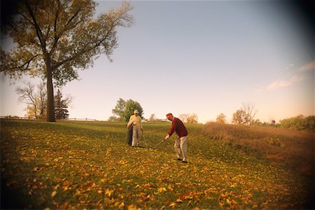 Playing Golf in Autumn Stock Photo - Rights-Managed, Code: 700-00150679