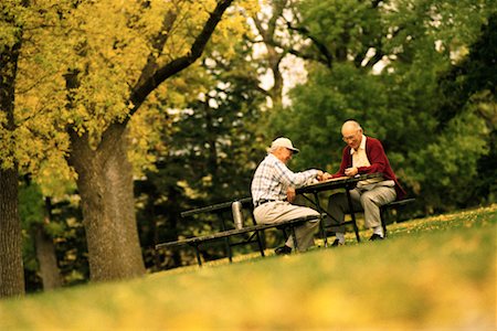 Two Mature Men Playing Chess Outdoors Stock Photo - Rights-Managed, Code: 700-00150671
