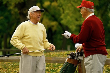 Two Mature Men Talking on Golf Course Stock Photo - Rights-Managed, Code: 700-00150685