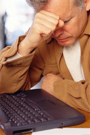 simsearch:700-00150702,k - Frustrated Man Working on Laptop Stock Photo - Rights-Managed, Code: 700-00150699