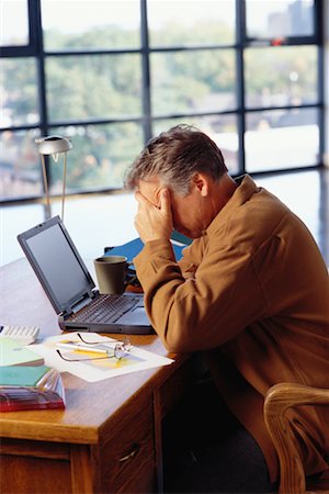 simsearch:700-00150702,k - Frustrated Man Working on Laptop Stock Photo - Rights-Managed, Code: 700-00150702