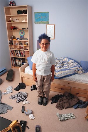 scattered bedroom - Boy in Messy Room Stock Photo - Rights-Managed, Code: 700-00150811