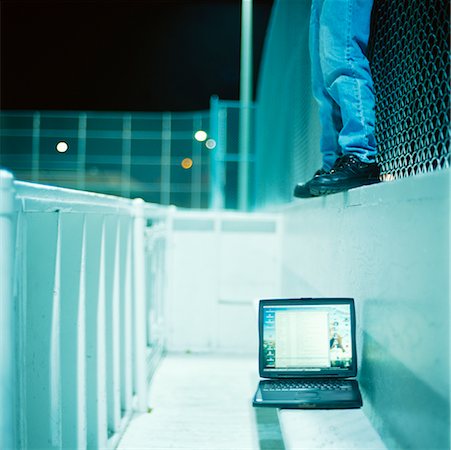 Laptop in Outdoor Ice Rink Stock Photo - Rights-Managed, Code: 700-00150878