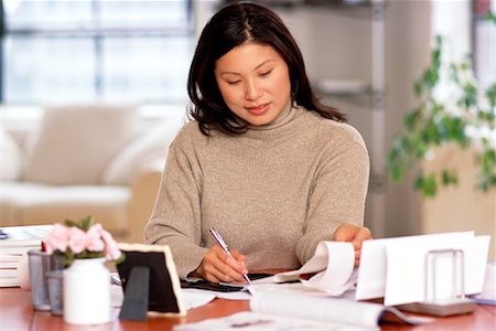 simsearch:700-00151235,k - Woman At Her Desk Stock Photo - Rights-Managed, Code: 700-00151244