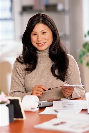 simsearch:700-00151235,k - Woman At Her Desk Stock Photo - Rights-Managed, Code: 700-00151240