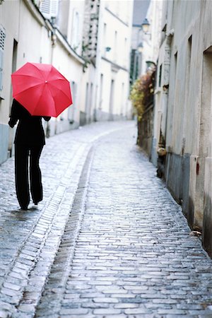 paris with rain - Woman Walking With Umbrella Stock Photo - Rights-Managed, Code: 700-00151266