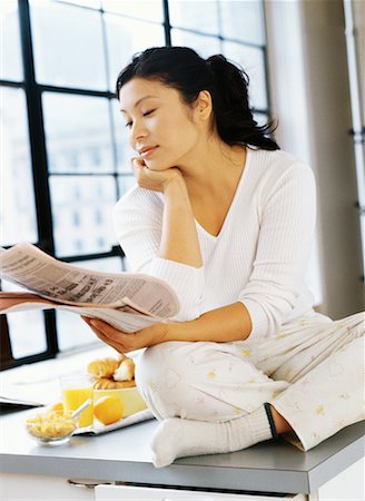simsearch:700-00062758,k - Woman Reading Newspaper Stock Photo - Rights-Managed, Code: 700-00151261