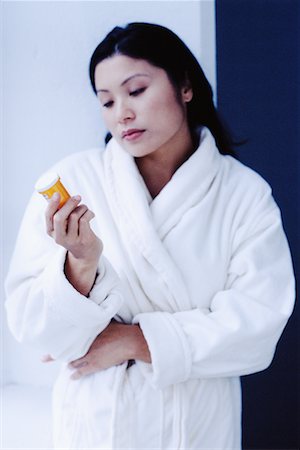 simsearch:700-00151235,k - Woman Reading Pill Bottle Stock Photo - Rights-Managed, Code: 700-00151263