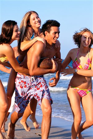 Teenagers Playing On The Beach Stock Photo - Rights-Managed, Code: 700-00151769