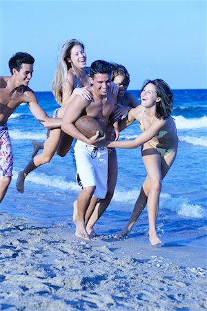 Teenagers Playing On The Beach Stock Photo - Rights-Managed, Code: 700-00151771