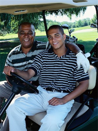 Father and Son Golfing Fotografie stock - Rights-Managed, Codice: 700-00152260
