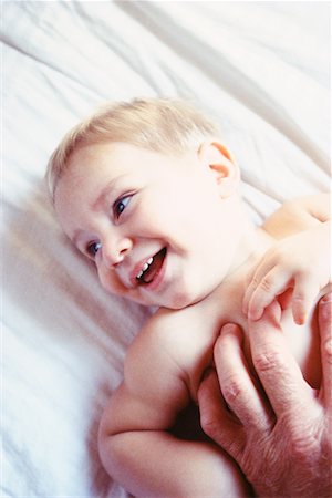 Hands Tickling Baby Stock Photo - Rights-Managed, Code: 700-00152423