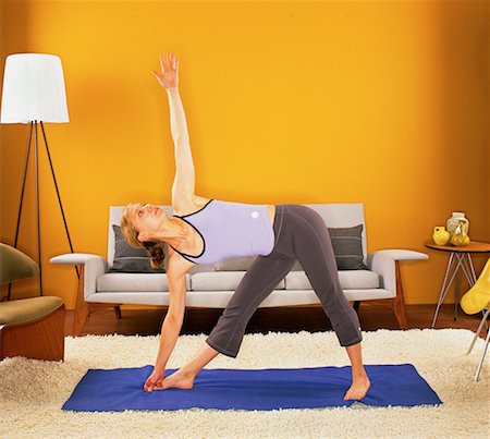 simsearch:700-00095929,k - Woman Practising Yoga in Her Living Room Stock Photo - Rights-Managed, Code: 700-00152540