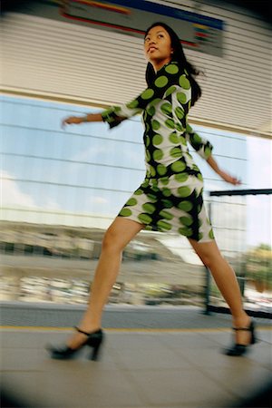 Blurred View of Woman Walking In Subway Station Stock Photo - Rights-Managed, Code: 700-00152764