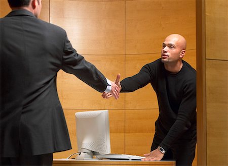 Businessmen Shaking Hands in Office Stock Photo - Rights-Managed, Code: 700-00153191