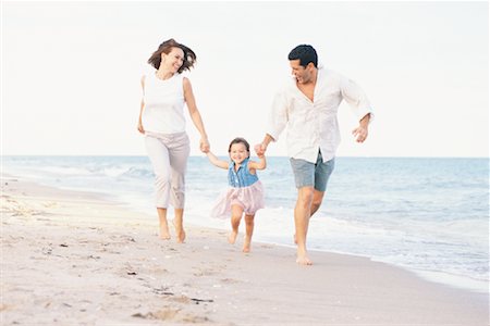 Family Walking on the Beach Stock Photo - Rights-Managed, Code: 700-00153277