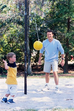 Father and Son Playing Tetherball Stock Photo - Rights-Managed, Code: 700-00153960