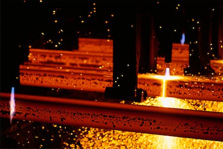 sparks of molten metal - Steel Beams Being Cut Stock Photo - Rights-Managed, Code: 700-00164559
