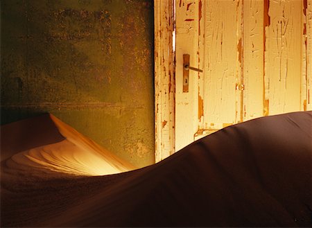 room in a old derelict house - Desert Sand in House Stock Photo - Rights-Managed, Code: 700-00165006