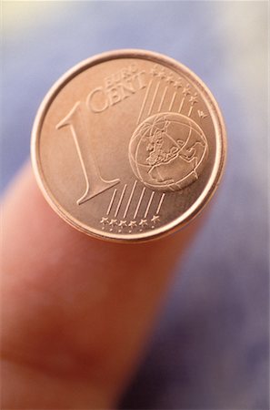 Finger with Euro Cent Coin Stock Photo - Rights-Managed, Code: 700-00165874