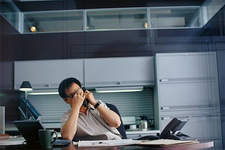 Man Working in Office Stock Photo - Rights-Managed, Code: 700-00165892