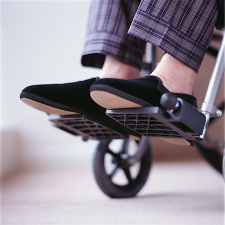 Man's Feet in Wheelchair Stock Photo - Rights-Managed, Code: 700-00166247