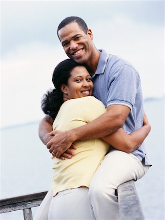 person leaning on rail with back - Couple Hugging Stock Photo - Rights-Managed, Code: 700-00166287