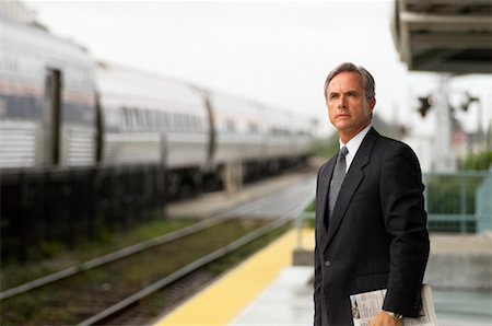 simsearch:700-01184393,k - Businessman Waiting at Train Station Stock Photo - Rights-Managed, Code: 700-00166439