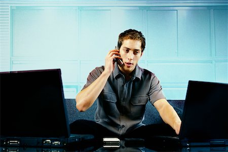 simsearch:700-00159009,k - Man Using Laptops and Cellular Phone Stock Photo - Rights-Managed, Code: 700-00166778