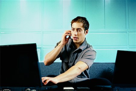 simsearch:700-00159009,k - Man Using Laptops and Cellular Phone Stock Photo - Rights-Managed, Code: 700-00166779