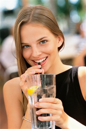 satisfied (thirst) - Teenager Drinking Glass of Water Foto de stock - Con derechos protegidos, Código: 700-00167139