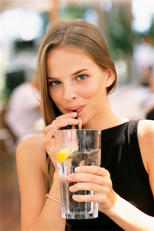 satisfied (thirst) - Teenager Drinking Glass of Water Foto de stock - Con derechos protegidos, Código: 700-00167140